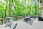 Back deck with dining area & grill